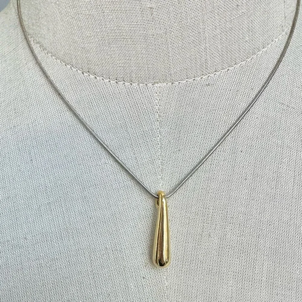 Gold tone pendant necklace